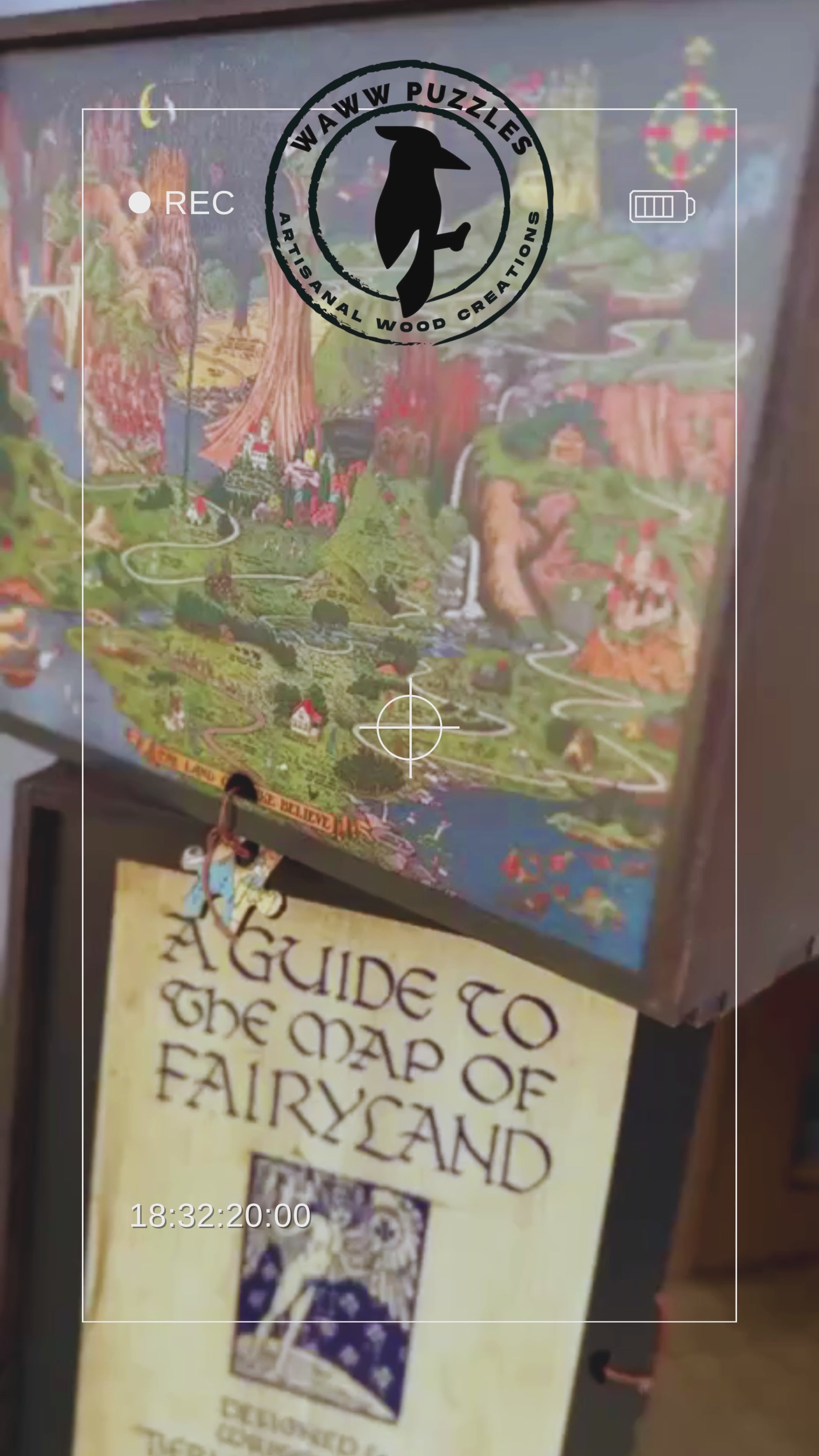 Flat lay of The Land of Make Believe wooden puzzle completed, showing vibrant fairytale map artwork by Jaro Hess.