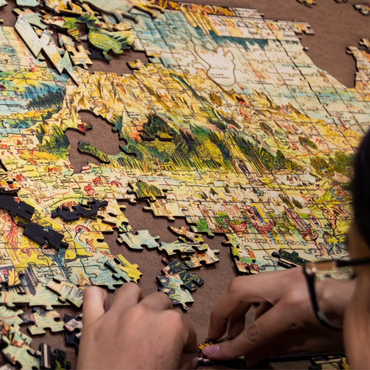 A high-quality wooden jigsaw puzzle of an ancient fantasy map of Fairyland, featuring mythical creatures, castles, and enchanted landscapes. Comes in a handmade wooden keepsake box. Bernard Sleigh Artwork, vintage land of dragons, fairies, trolls, witches, wizards, gnomes and nursery rhymes.
