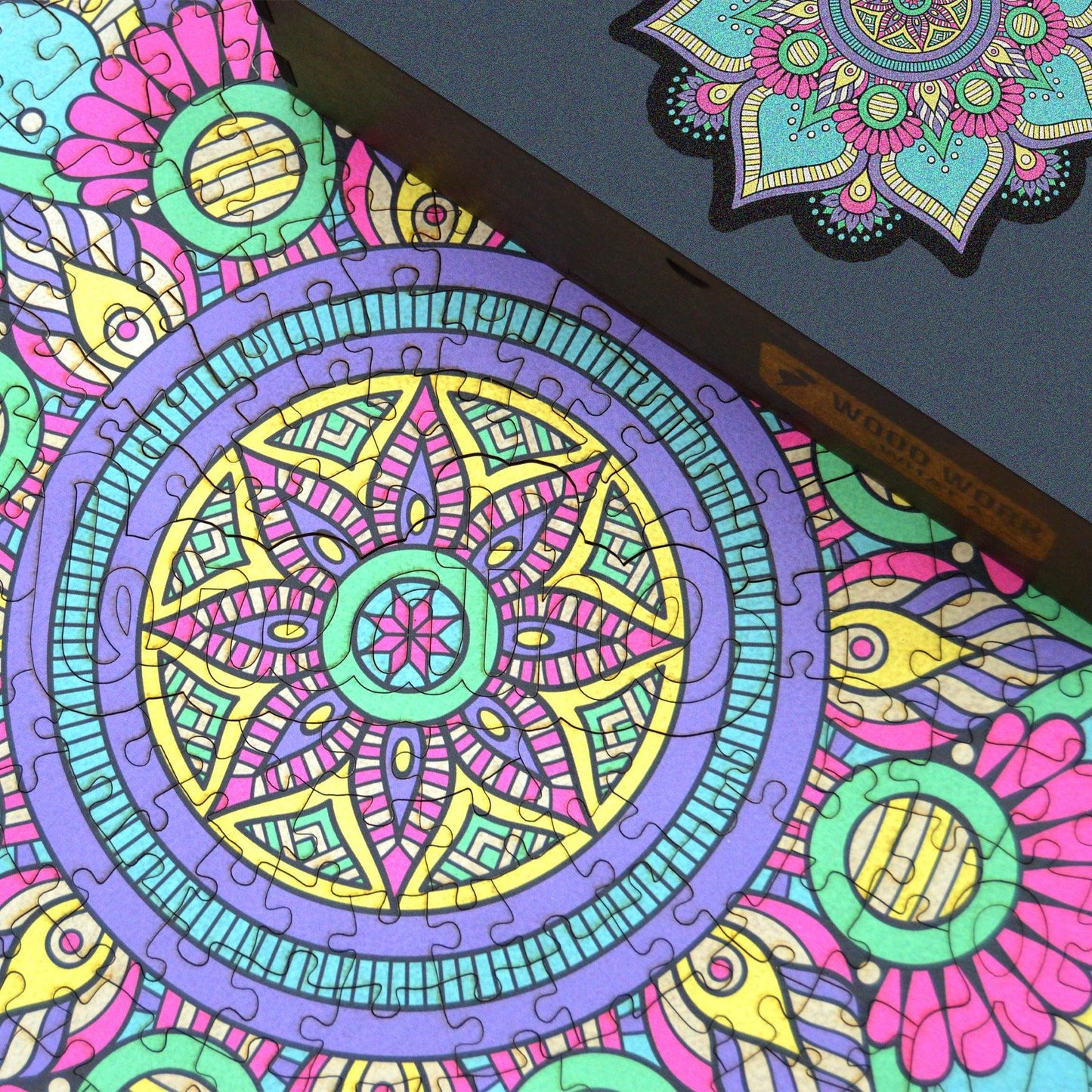 Handcrafted wooden box containing a colorful mandala puzzle with intricate patterns. Unique and artistic gift. WAWW Puzzles