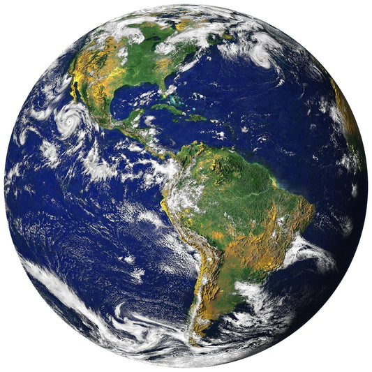 A high-quality round wooden jigsaw puzzle of Earth, featuring a realistic image of the planet’s blue oceans, green continents, and swirling clouds as seen from space. Comes in a handmade wooden keepsake box.