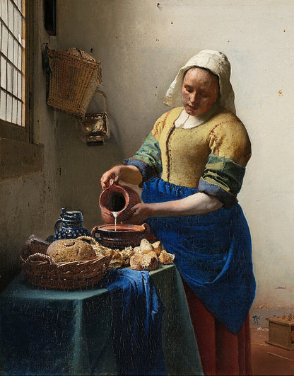 Johannes Vermeer's The Milkmaid, featuring a maid pouring milk in a serene domestic scene with rich colors.
