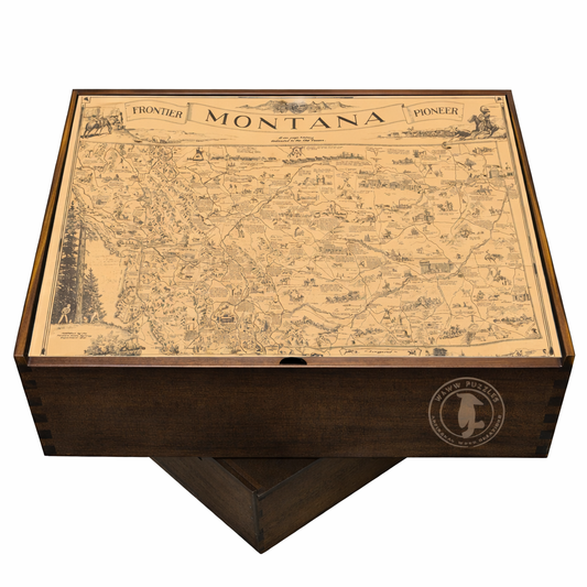 Puzzle box featuring Irvin Shope's Montana map design with colorful historical imagery