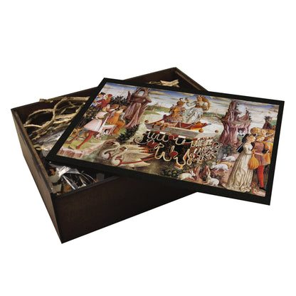 A Renaissance wooden jigsaw puzzle featuring Francesco del Cossa’s Triumph of Venus, depicting Venus on a chariot drawn by swans, surrounded by mythological figures, including the Three Graces, satyrs, and cupids, in a lively spring celebration.