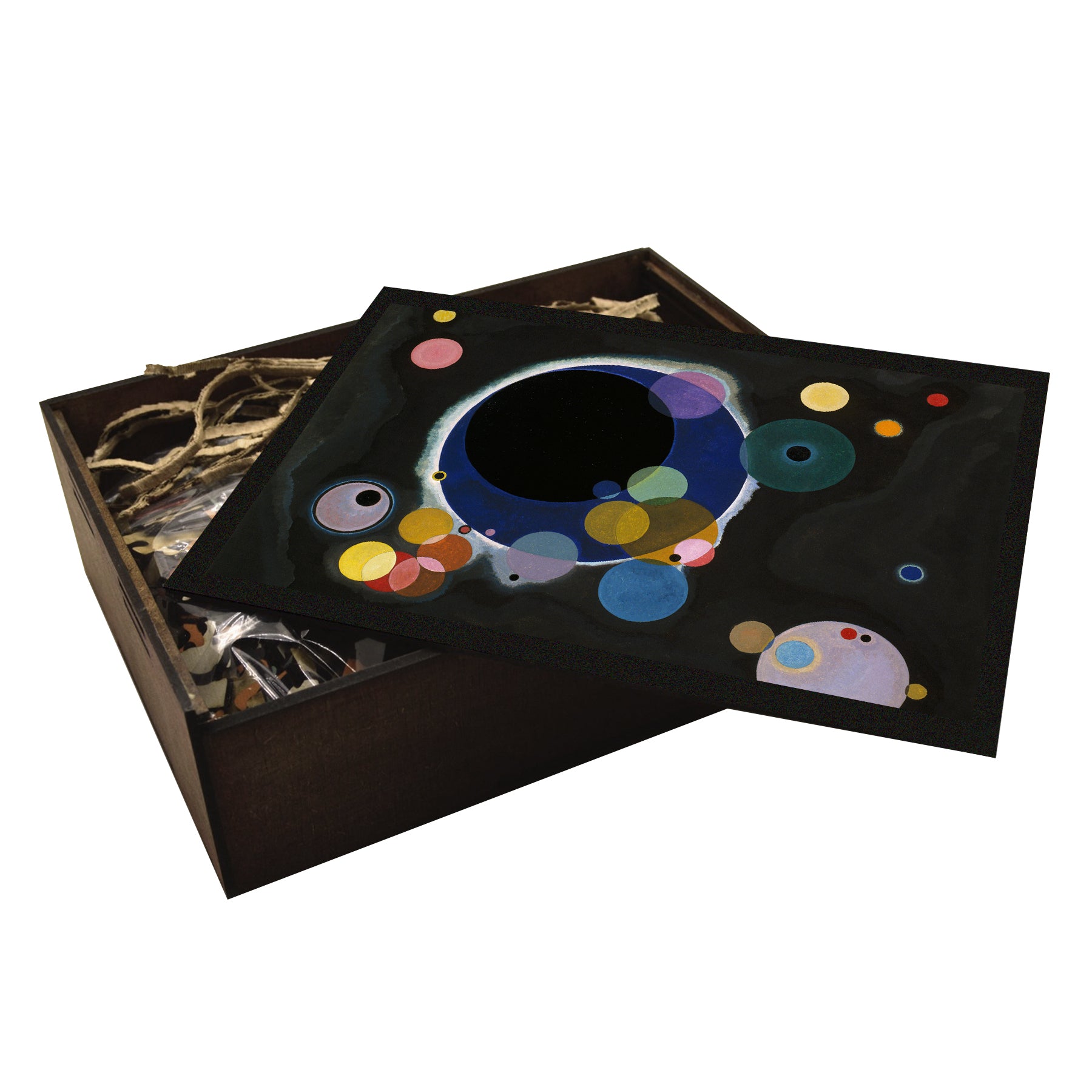 A high-quality wooden jigsaw puzzle of Wassily Kandinsky’s "Several Circles," featuring colorful orbs floating in a deep black space, creating a cosmic and abstract composition. Comes in a handmade wooden keepsake box.