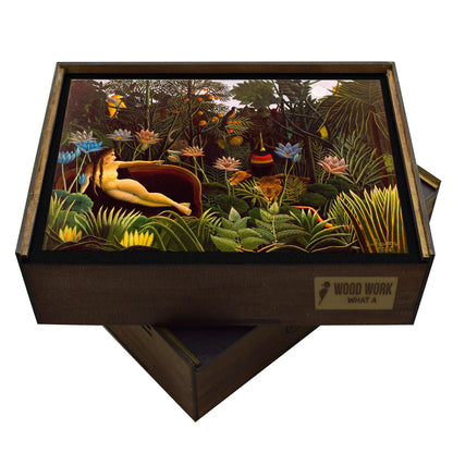 Henri Rousseau’s ‘The Dream’ wooden jigsaw puzzle, featuring a lush jungle scene with exotic animals, vibrant foliage, and a reclining nude figure.