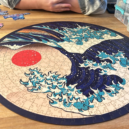 A large, circular puzzle depicting a vibrant, colorful wave with a red circle in the center.