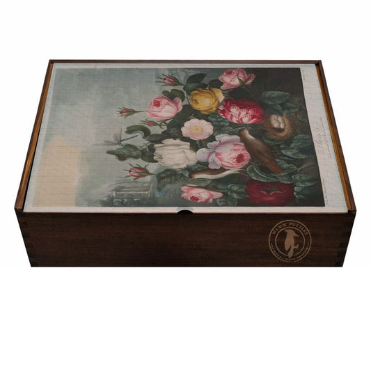 puzzle wooden box with floral design on the lid and brand logo on a white background