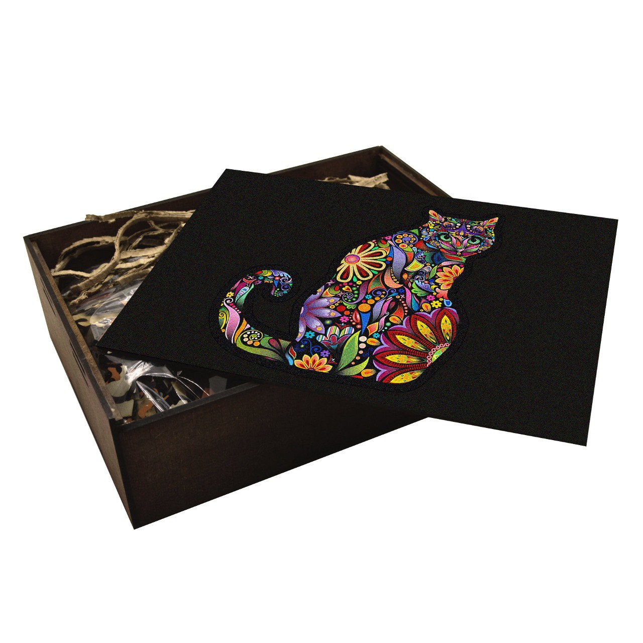 wooden handcrafted box containing a puzzle of a cat