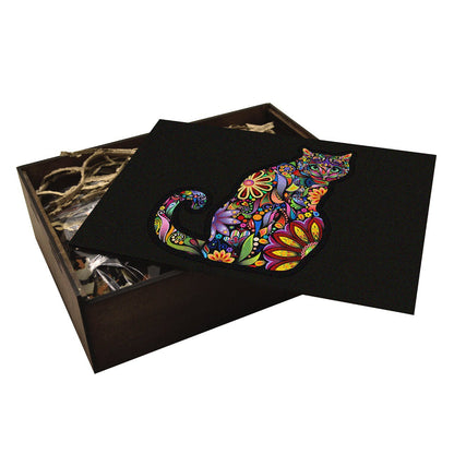 wooden handcrafted box containing a puzzle of a cat