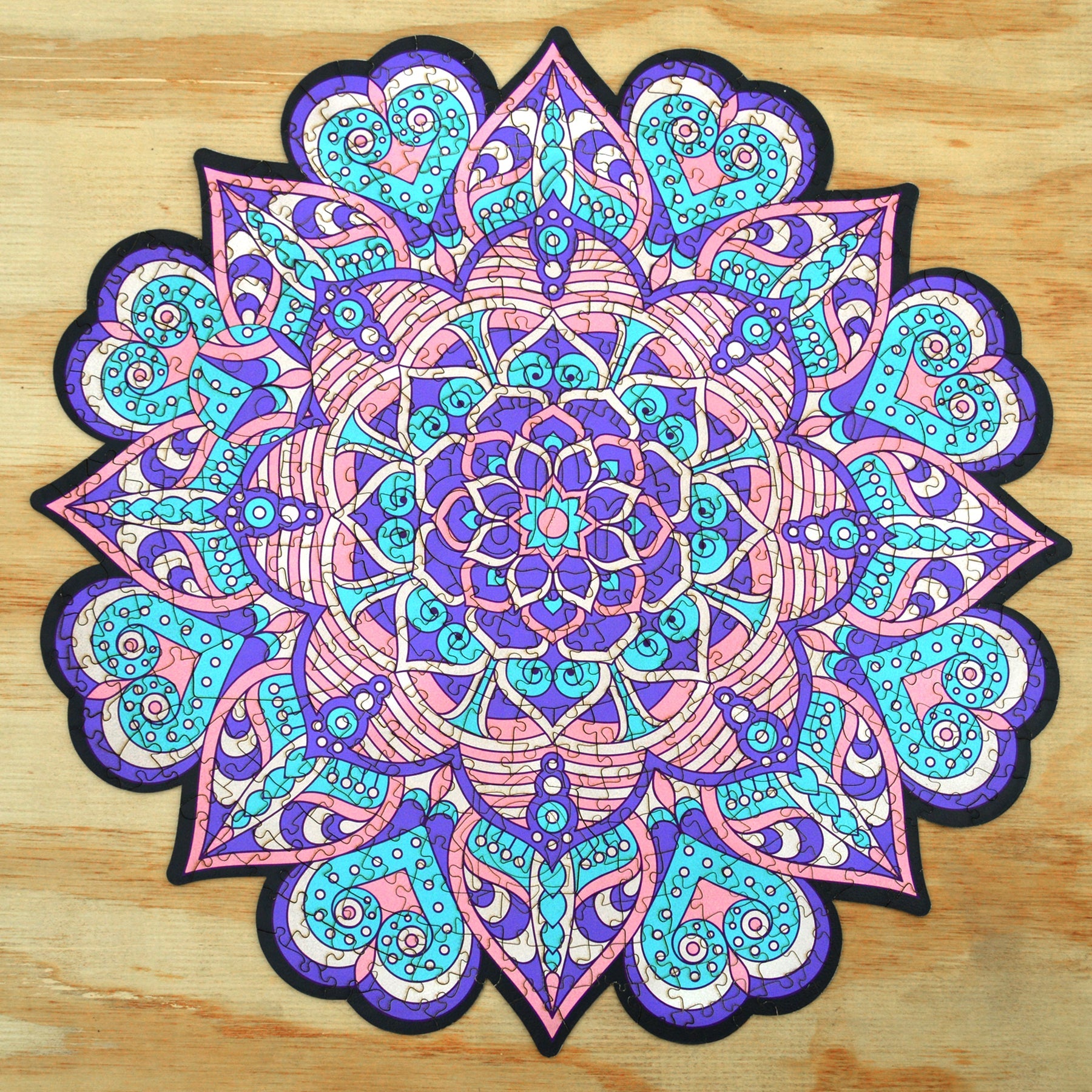 colorful mandala wooden jigsaw puzzle with a geometrical design.