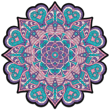 colorful mandala wooden jigsaw puzzle with a geometrical design. pURPLE AND PINK TONES, HAS A CENTRAL FOCAL JIGSAW PIECE THAT READS THE MANTRA calm.
