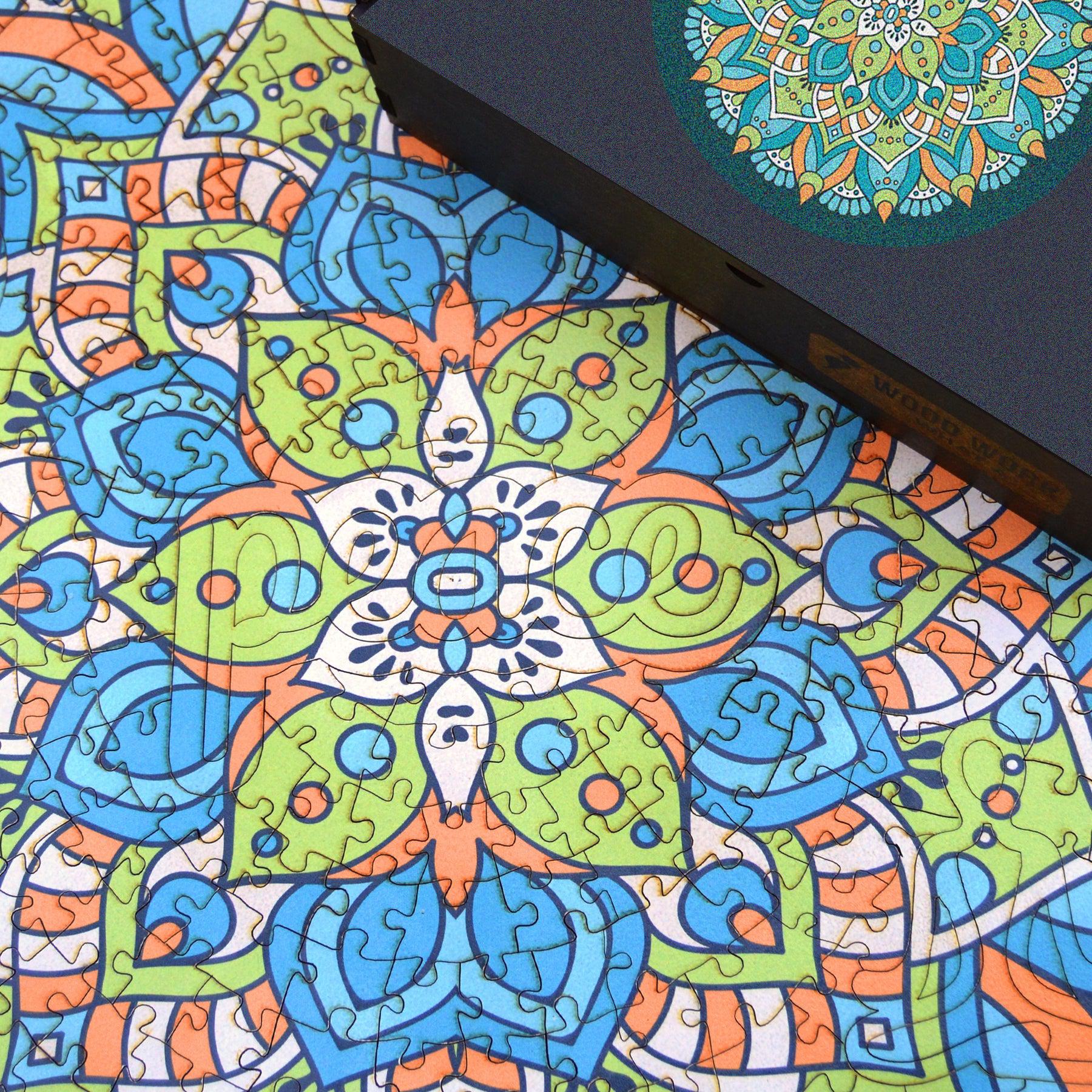 Handcrafted wooden box containing a colorful mandala puzzle with intricate patterns. Unique and artistic gift. WAWW Puzzles