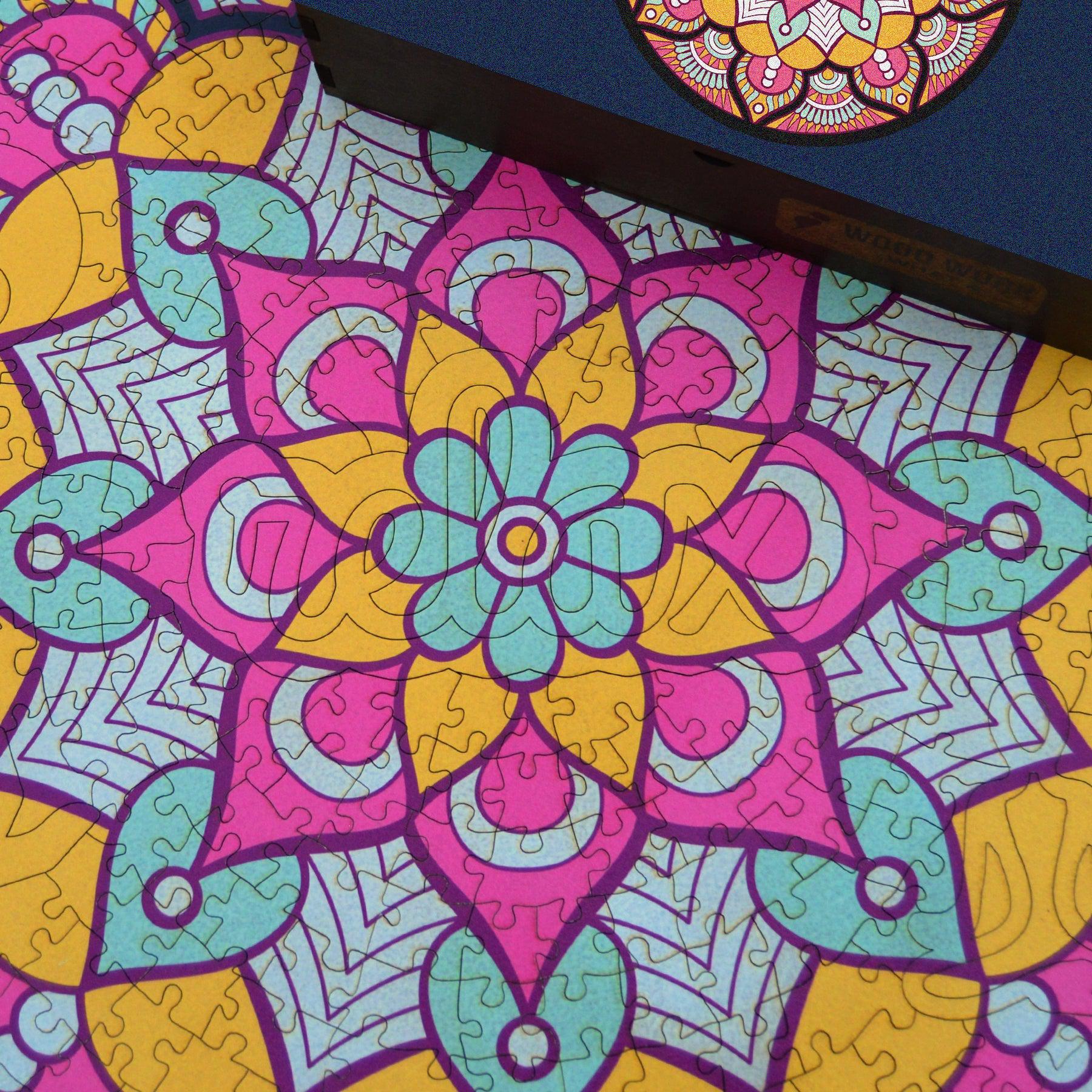 Handcrafted wooden box containing a colorful mandala puzzle with intricate patterns. Unique and artistic gift. WAWW Puzzles